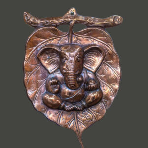 Casting black metal Ganesha on Peepal Leaf Wall Hanging – Handcrafted Blessings