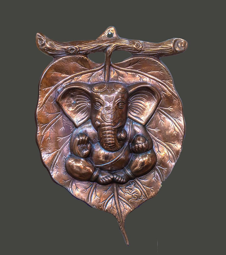 Casting black metal Ganesha on Peepal Leaf Wall Hanging – Handcrafted Blessings